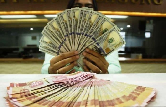 rupiah_melemah_seiring_investor_amati_inflasi_produsen_as