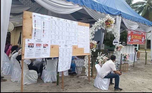 sambut_para_pemilih_tps_di_batu_bara_seperti_pesta_kawinan