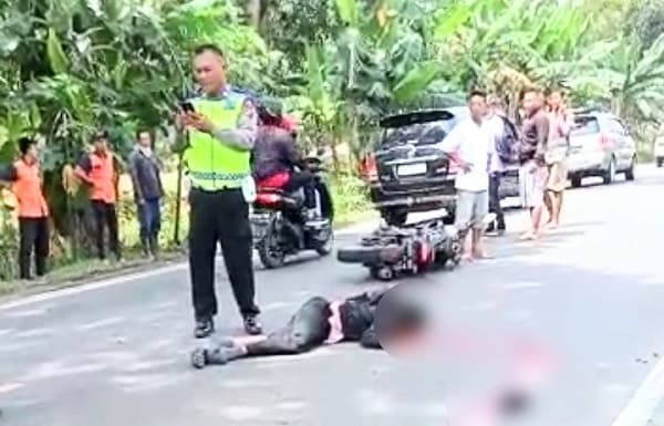 seorang_asn_pemkab_batu_bara_tewas_terlindas_kupj_tour_di_jalinsum_medan_kisaran