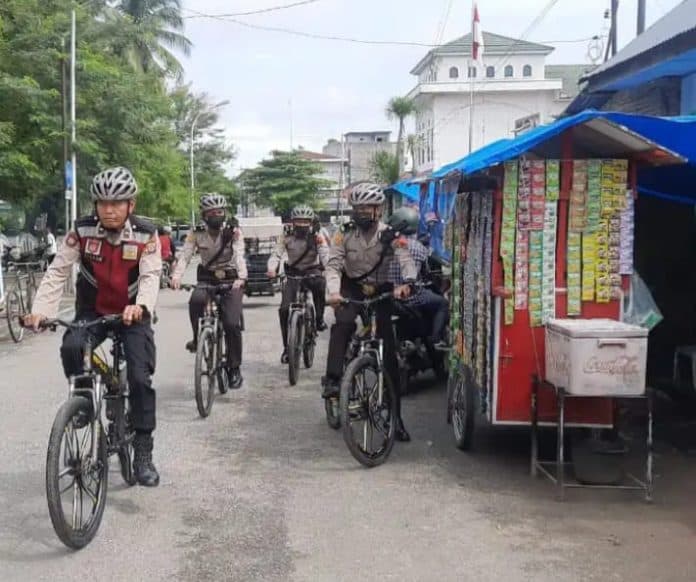 sosialisasi_call_center_personil_polisi_gelar_patroli_bersepeda
