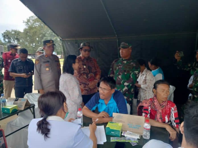 tmmd_ke_121_di_desa_hasinggaan_libatkan_12_personel_polres_samosir