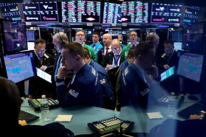 wall_street_melambung_ditopang_reli_saham_energi_dan_teknologi