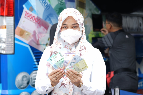 warga_medan_diedukasi_terkait_qris_dan_penukaran_uang_baru_emisi_2022