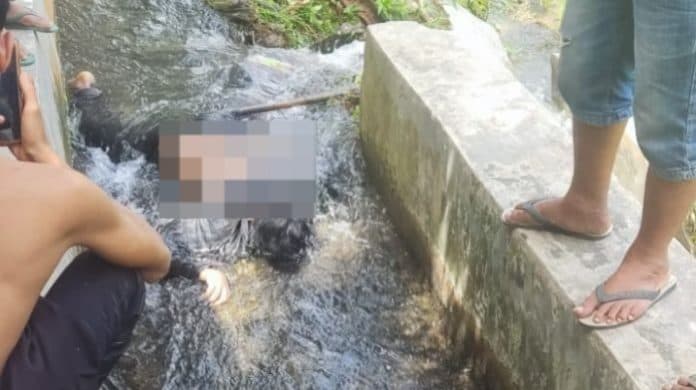 warga_palas_digegerkan_adanya_penemuan_mayat_pria_di_saluran_irigasi