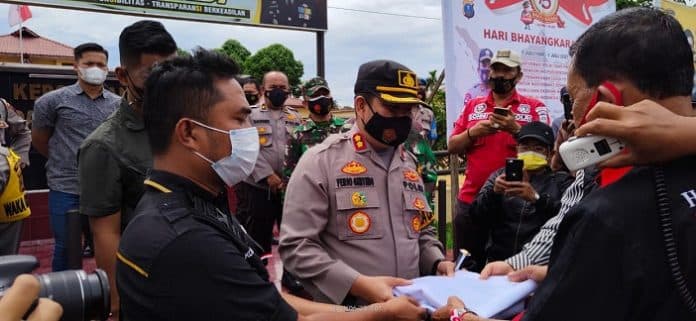 wartawan_dairi_turun_ke_jalan_desak_polri_ungkap_kasus_penembakan_marsal_harahap_di_simalungun