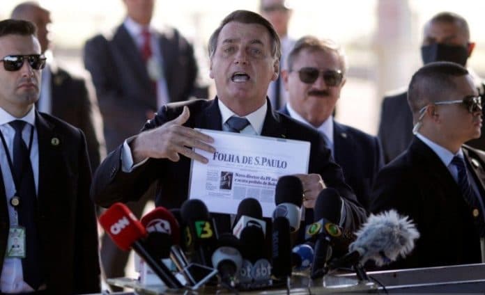 wartawan_peliput_presiden_brazil_jair_bolsonaro_dikarantina