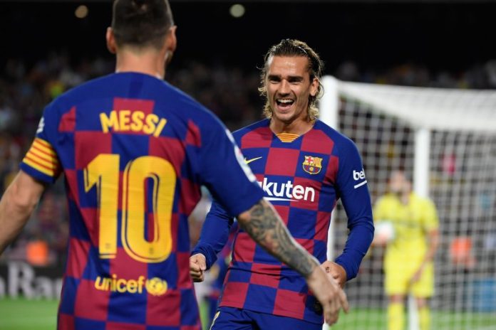 Lionel Messi dan Antoine Griezmann melakukan selebrasi usai mencetak gol ke gawang Villareal.(marca