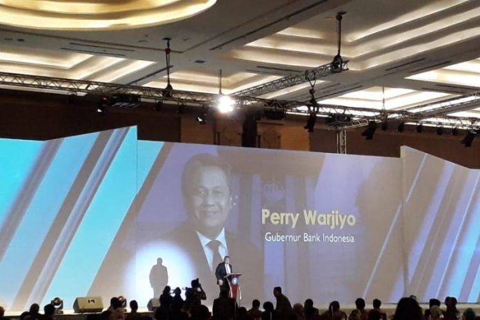 Gubernur Bank Indonesia (BI) Perry Warjiyo saat memberikan kata sambutan dalam Seminar Nasional yang digelar Sekolah Bisnis IPB di Jakarta, Sabtu (2/11/2019). ANTARA/M Razi Rahman