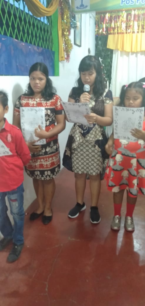Anak-anak anggota STM Holong Saroha sedang berliturgi