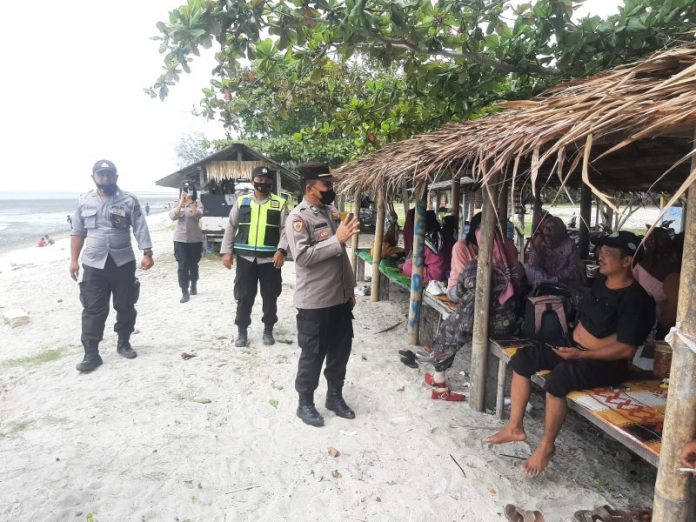 Objek Wisata Pantai di Batu Bara Dipadati Ribuan Pengunjung, Polisi Perketat Pengamanan