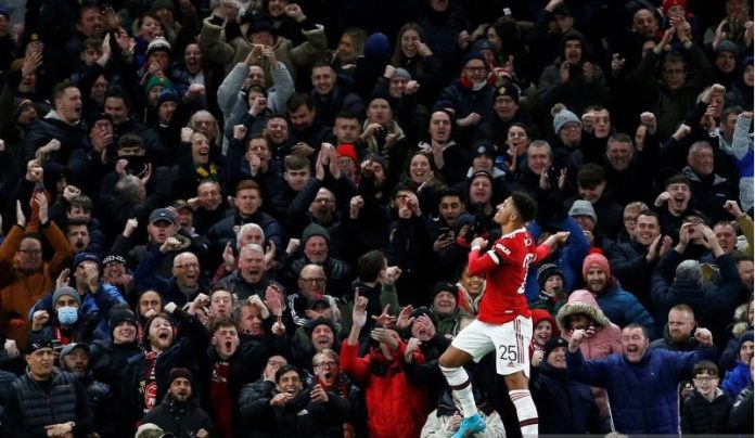 Pemain Manchester United Jadon Sancho merayakan gol pertama mereka selama Putaran Keempat Piala FA pada Manchester United vs Middlesbrough di Old Trafford, Manchester, Inggris, Jumat (4/2/2022). ANTARA FOTO/REUTERS/Craig Brough/rwa/sad. (REUTERS/CRAIG BROUGH)