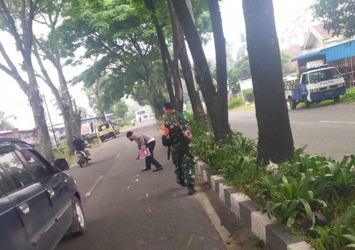 Petugas Satlantas Polres Pematang Siantar melakukan olah TKP di Jalan Sisingamangaraja, Kota Pematang Siantar, Rabu (3/5/23). (Foto: Ist/mistar.id)