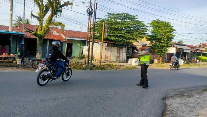 Suasana lalulintas di Jalan Asahan Kabupaten Simalungun, Rabu pagi.