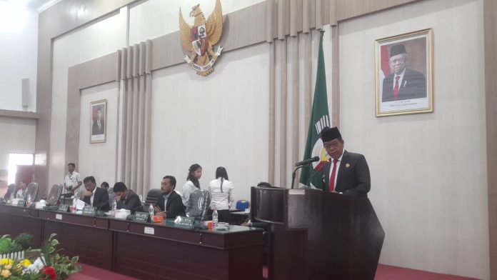Bupati Simalungun Radiapoh Hasiholan Sinaga membacakan laporan realisasi anggaran