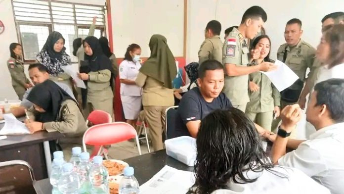 Deteksi dini PTM di kantor Sat Pol PP Kabupaten Batu Bara.