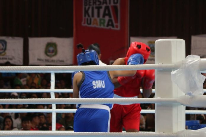 Petinju putri Sumut ketika berhadapan dengan petinju asal Maluku