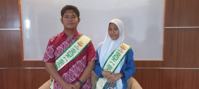 Rayhans Jeremy Siburian (kiri) dan Felisha Meylasyani (kanan), duta terpilih SMAN 2 Medan (f:susan/mistar)