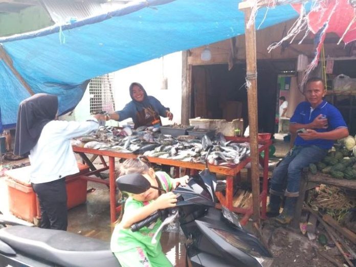 Hartati, salah seorang pedagang ikan di Lubuk Pakam