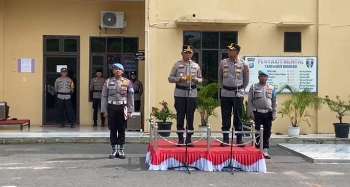 AKBP Maringan dan AKBP Arfin Fachreza saat memimpin apel Farewell Parade.