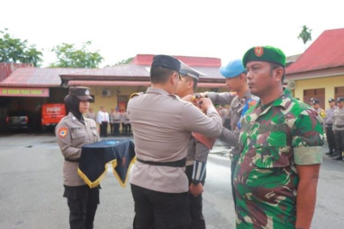 Kapolres Sibolga AKBP Achmad Fauzy memimpin Apel Gelar Pasukan Operasi Zebra Toba 2024.