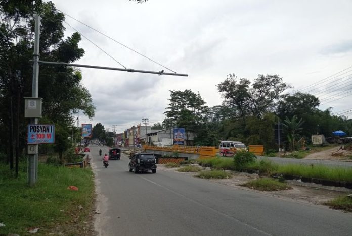 Kondisi arus lalu lintas di Jembatan Sigagak, Jalan Medan Pematangsiantar terpantau lancar.