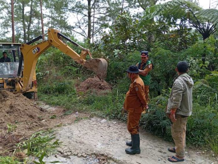 Longsor yang terjadi di Desa Sigapiton.